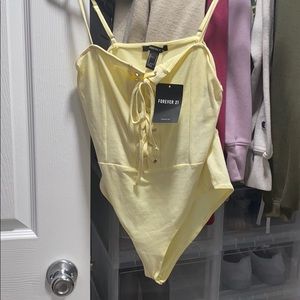 Yellow Lace Up body suit
